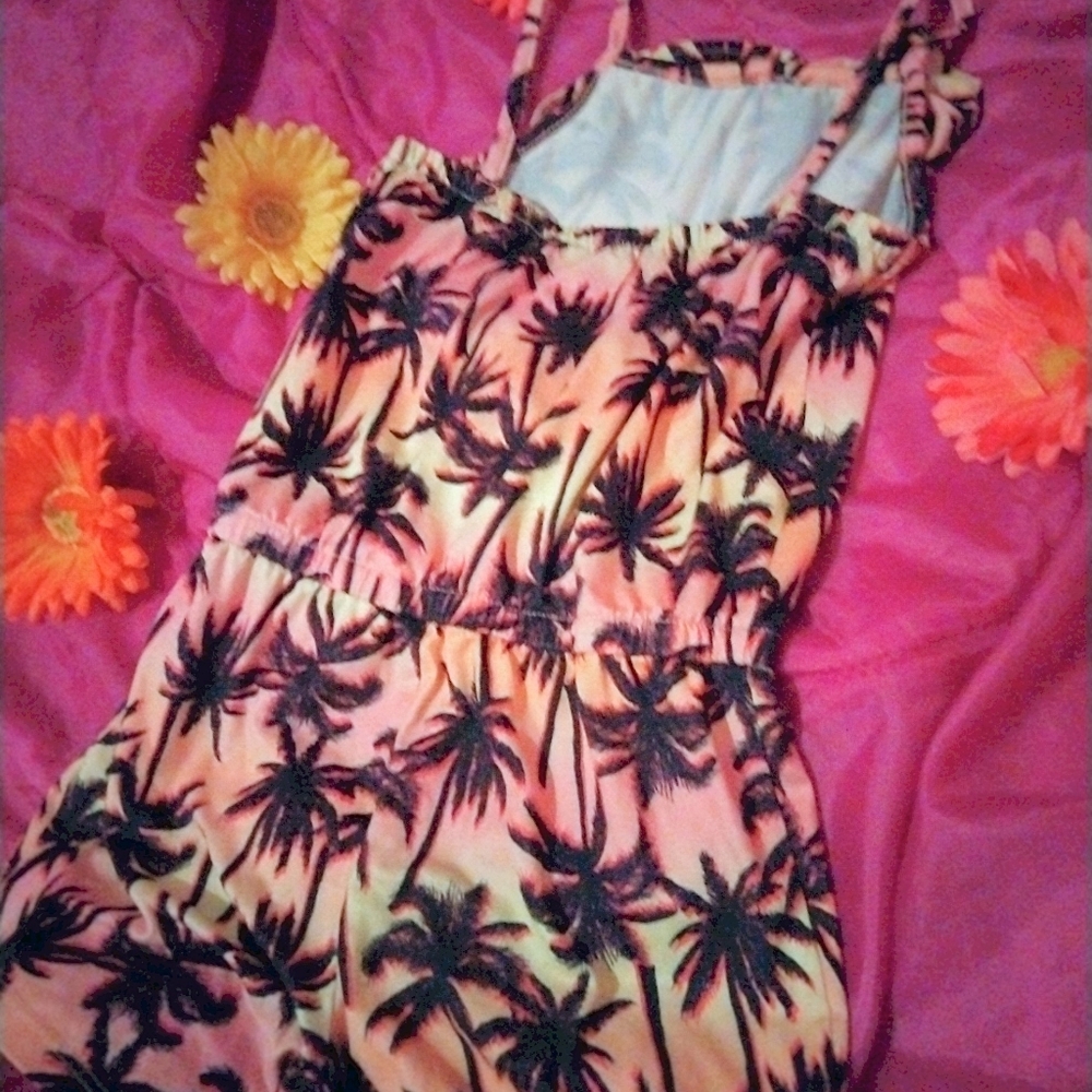 I am selling a romper with palm tree design